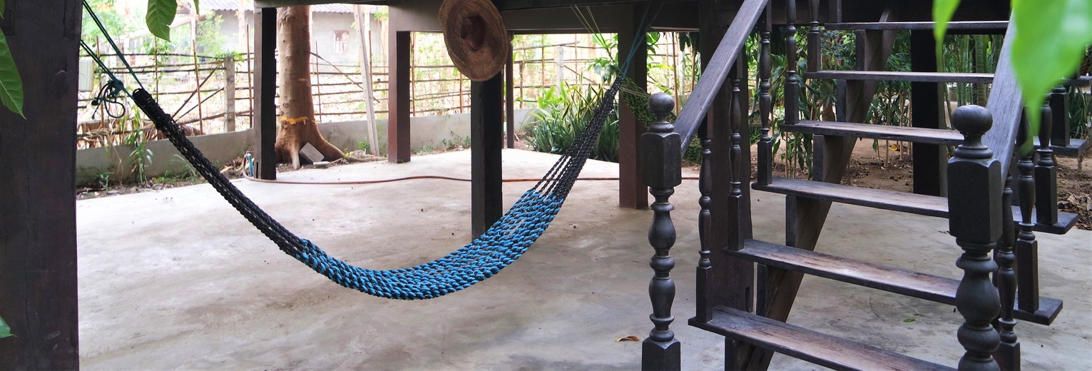 Kom tot rust in de hangmat bij de accommodatie Little Village, buiten Chiang Mai, Thailand