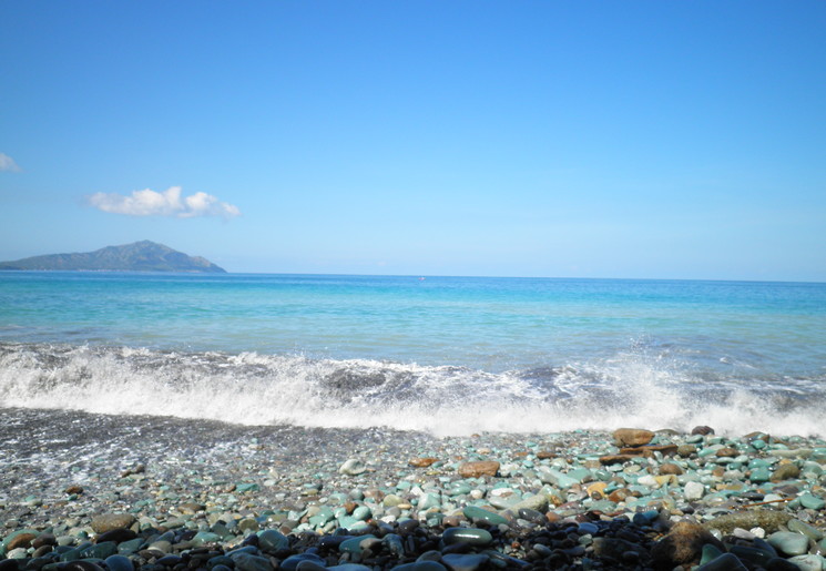 Blauw strand van Penggajawa