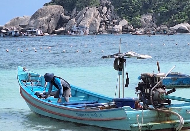 Tip van Heleen: Betaal een local met een longtailboot voor de hele dag en ga snorkelen