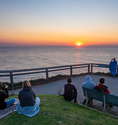Zonsondergang vanaf uitzichtpunt Byron Bay, Australië - © Tourism Australia