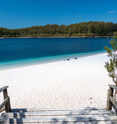 Het witte strand van Lake McKenzie, Fraser Island