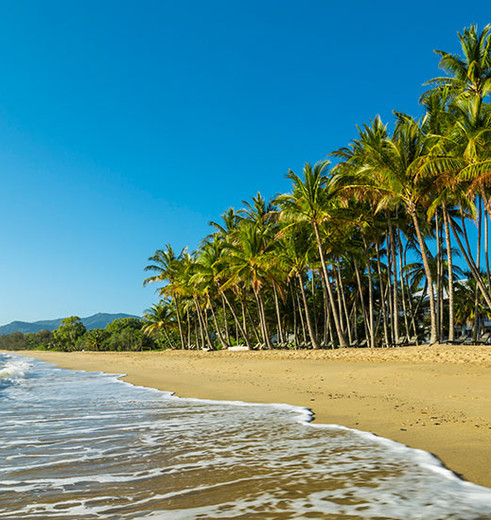 Rust uit op Palm Cove strand in Cairns