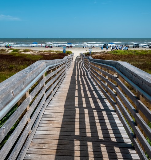 Opgang naar het strand van Galveston, Texas, USA Opgang naar het strand van Galveston, Texas, USA