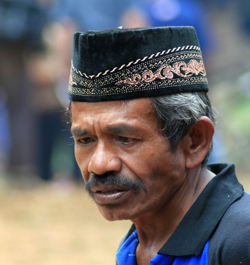 Indonesie-Sulawesi-toraja-man-hoed