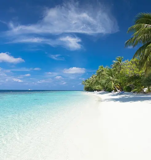 Genieten aan een van de vele prachtige stranden bij de Malediven